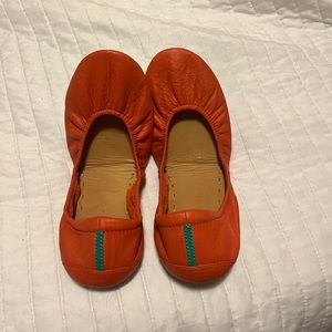 Orange Tieks like new worn once size 10